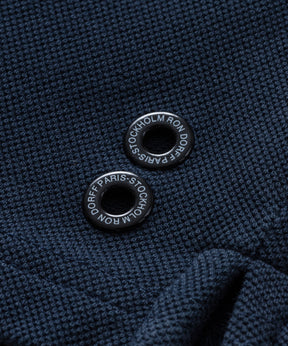 Polo à col fermeture éclair en coton piqué: Bleu marine