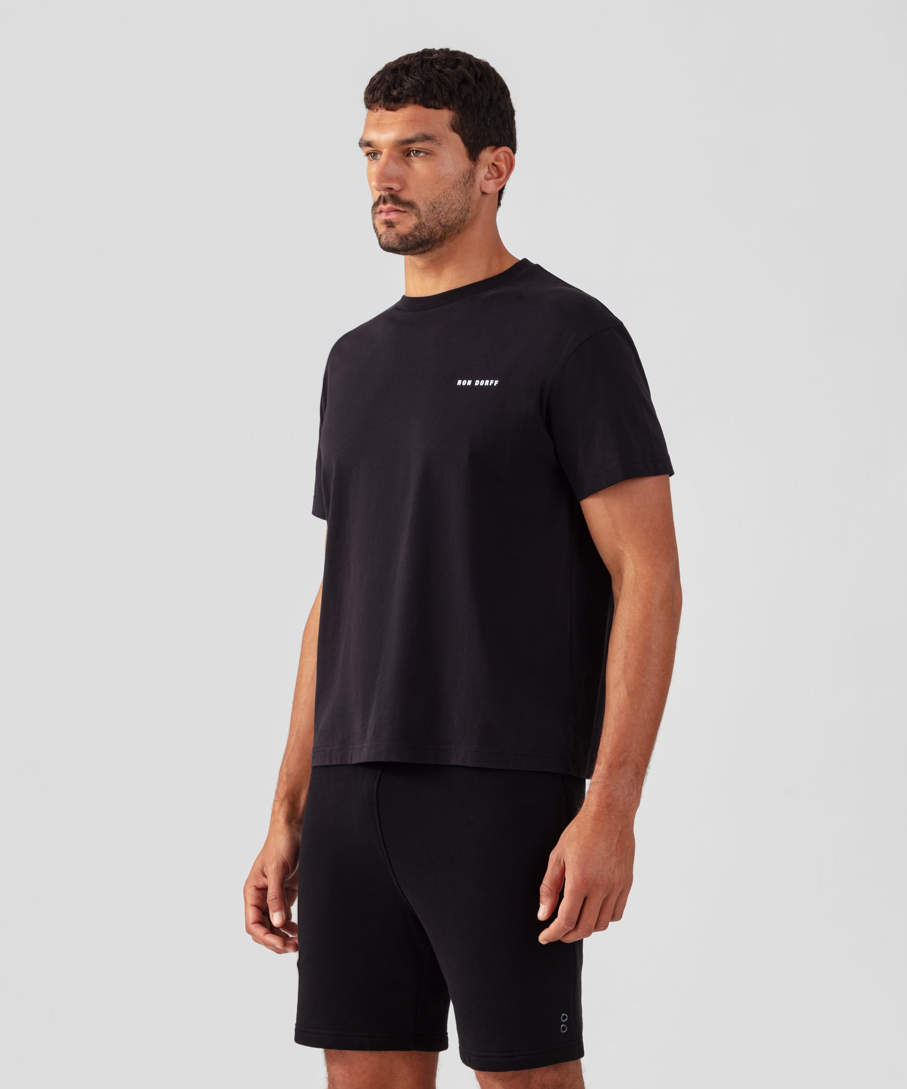 T-shirt coupe décontractée en coton organique à imprimé RON DORFF: Noir