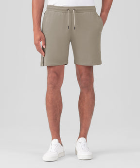 Short de jogging en coton piqué avec passepoil: Beige foncé