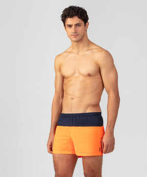 Short de bain bicolore: Bleu marine/orange fluo