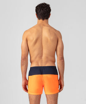 Short de bain bicolore: Bleu marine/orange fluo