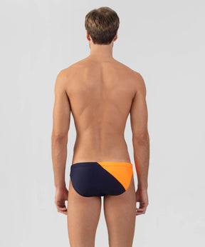 Slip de bain échancré bicolore: Bleu marine/orange fluo