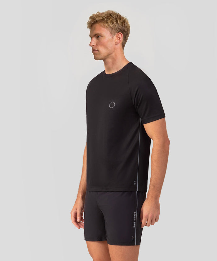 T-shirt de sport avec passepoil réfléchissant: Noir