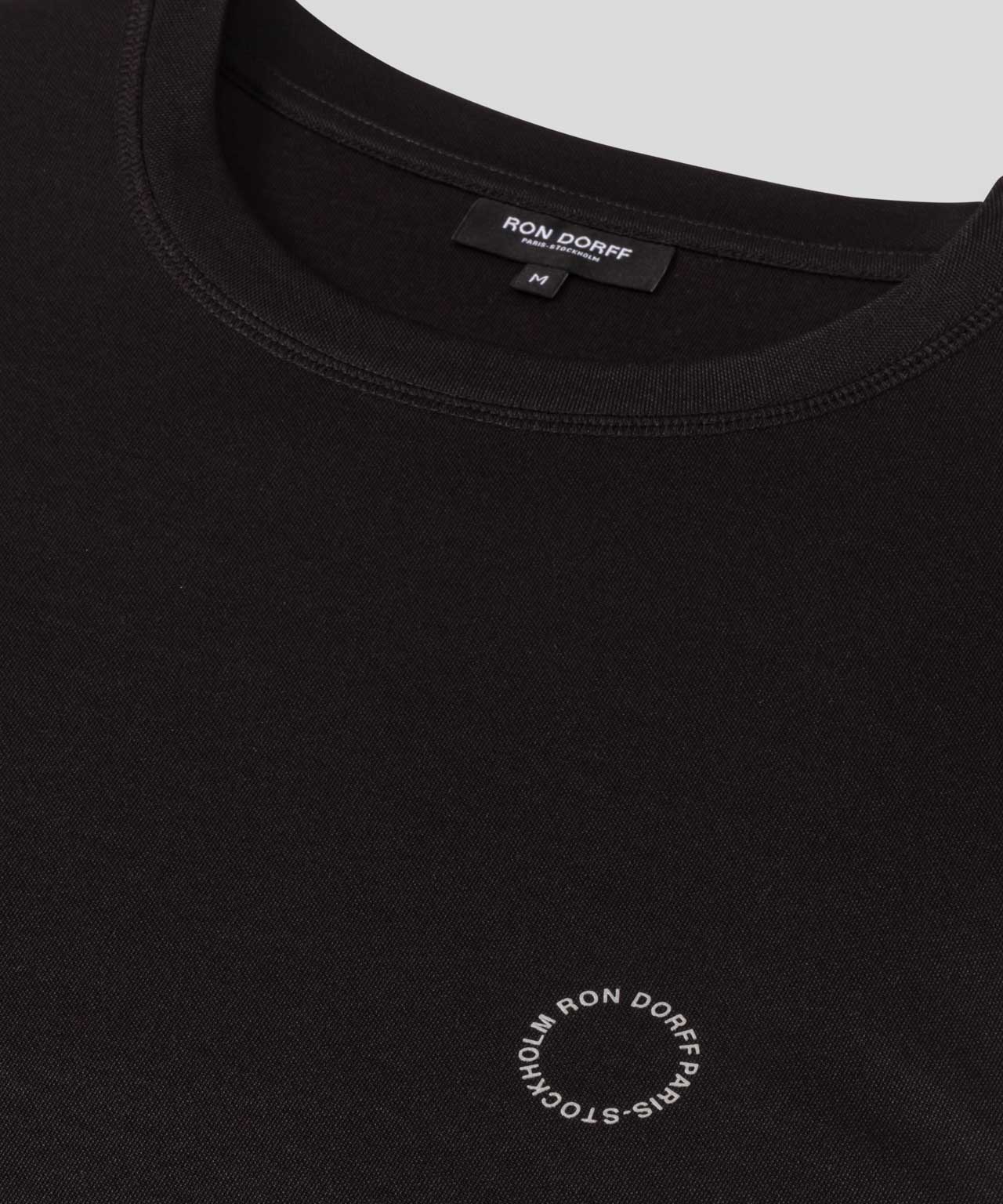 T-shirt de sport avec passepoil réfléchissant: Noir