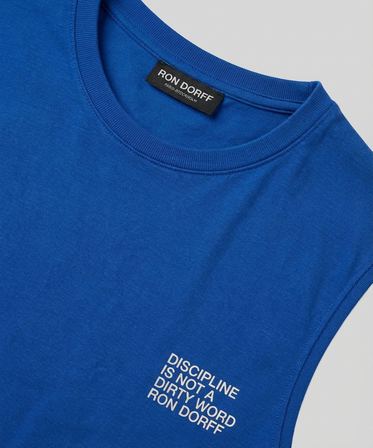 Ärmelloses T-Shirt aus Bio-Baumwolle "DISCIPLINE": Blau