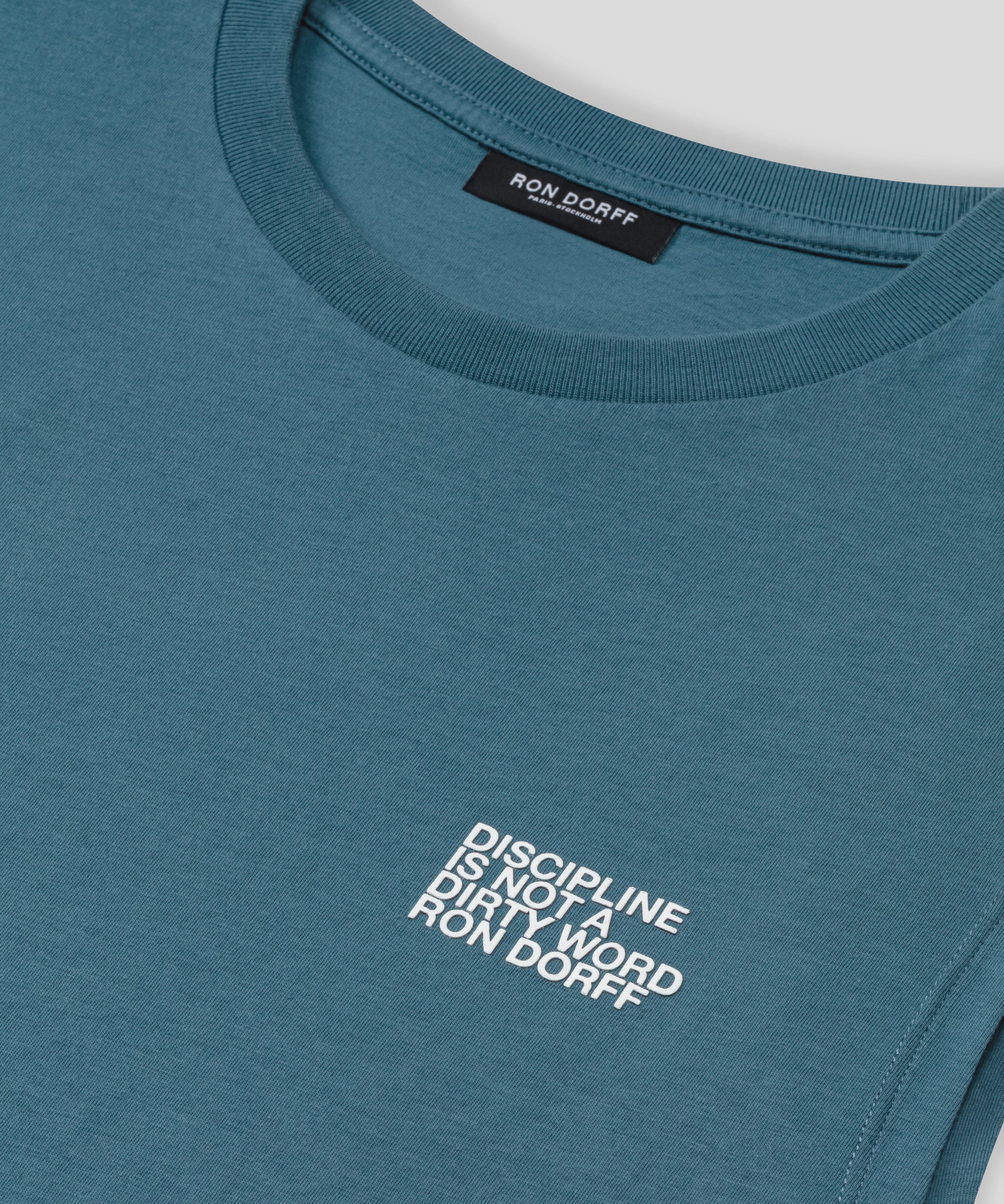 Organic Cotton Sleeveless T-Shirt "DISCIPLINE": Baltic Blau