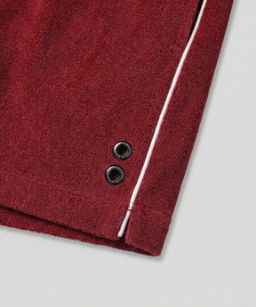 Tennis Short en coton terry avec piping: Rouge